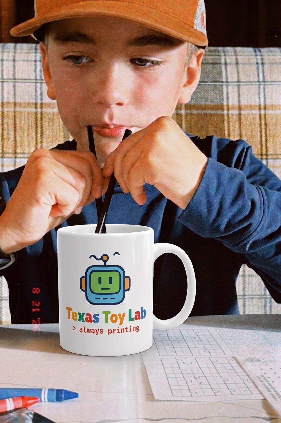 Joseph sipping from the Always Printing Mug