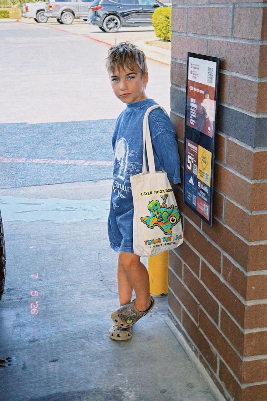 Kid carrying the Lab Robot Tote